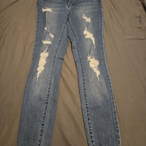 Trendy Distressed Skinny Jeans in Blue